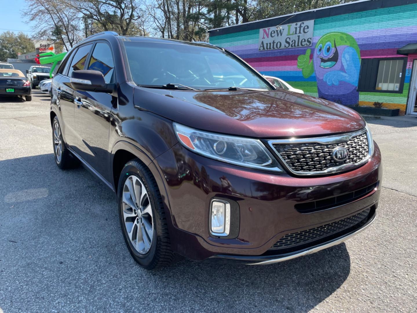 2015 PLUM KIA SORENTO SX (5XYKW4A77FG) with an 3.3L engine, Automatic transmission, located at 5103 Dorchester Rd., Charleston, SC, 29418-5607, (843) 767-1122, 36.245171, -115.228050 - Local Trade-in with Leather, Panoramic Sunroof, Navigation, Backup Camera, CD/AUX/Sat/Bluetooth, Dual Climate Control, Power Everything (windows, locks, seats, mirrors), Heated/Cooled/Memory Seating, Power Liftgate, Convenient Third Row, Push Button Start, Keyless Entry, Alloy Wheels. Certified One - Photo#0